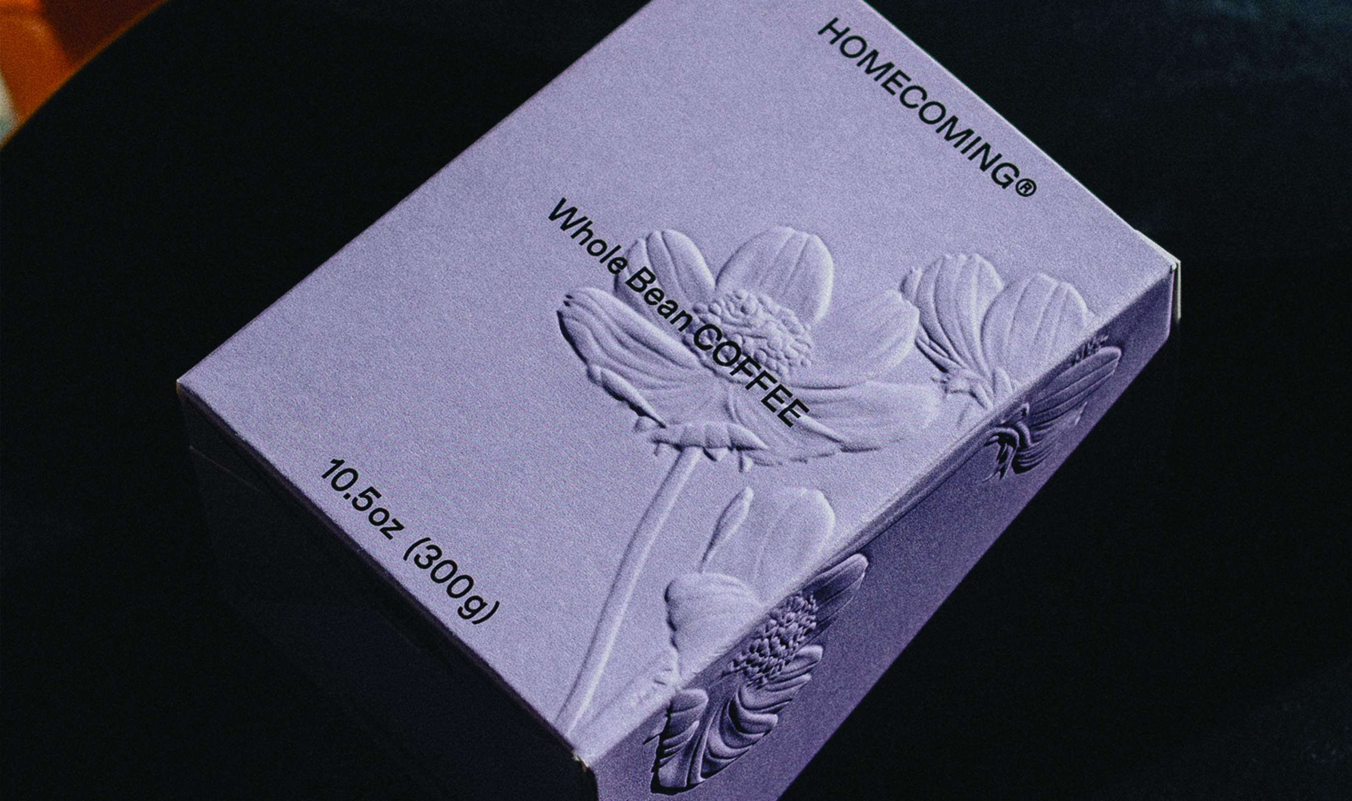 A photo of a blind debossed box in purple